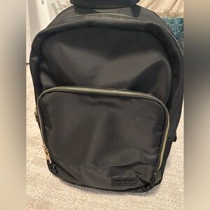 Black Minimalist Backpack with Gold Accents